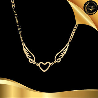 TrĂšs joli collier en acier inoxydable avec coeur & ailes disponible chez Les Flammes de la LumiĂšre