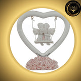 Adorable Balançoire en Coeur avec coeur et petits Anges amoureux disponible chez Les Flammes de la Lumière