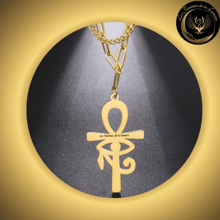 Beau collier Egyptien avec Croix Ankh et Oeil d'Horus - Acier inoxydable disponible chez Les Flammes de la Lumière