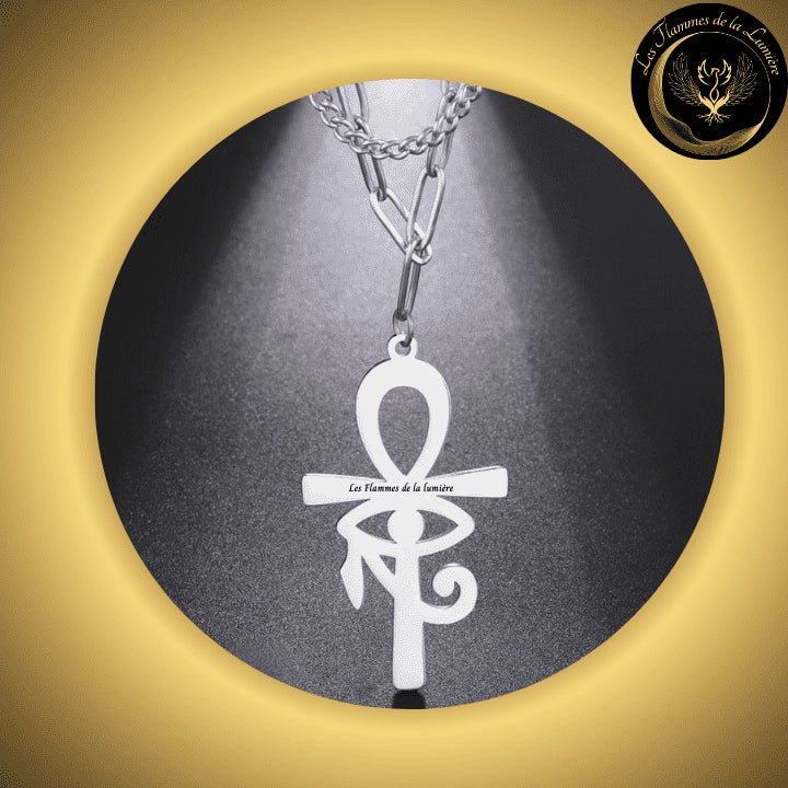 Beau collier Egyptien avec Croix Ankh et Oeil d'Horus - Acier inoxydable disponible chez Les Flammes de la Lumière