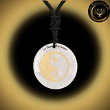 Beau Collier en Cristal de Roche - Géométrie Sacrée Yin Yang disponible chez Les Flammes de la Lumière