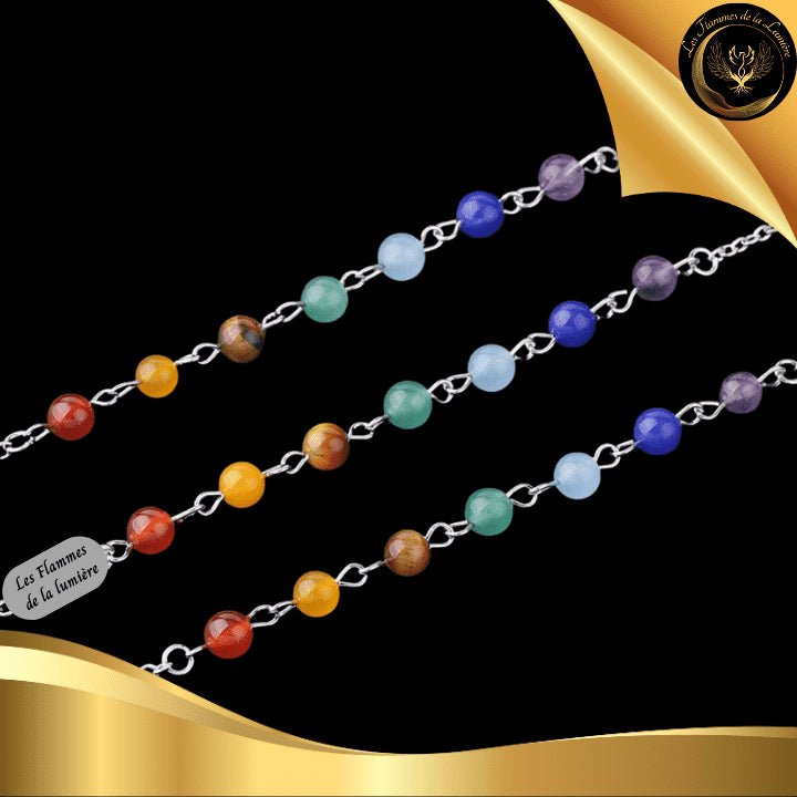 Beau Pendule 7 chakras & Cristal de Roche disponible chez Les Flammes de la Lumière