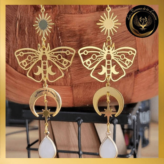 Belles boucles d'oreilles papillon soleil & lune disponible chez Les Flammes de la Lumière