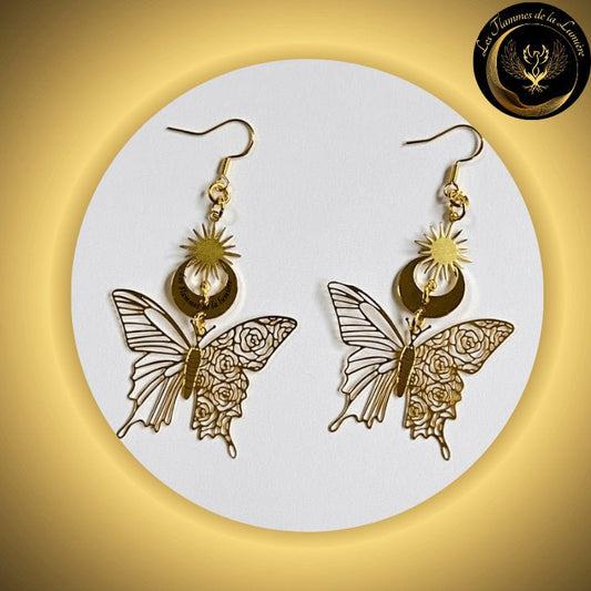 Belles boucles d'oreilles papillon soleil & lune disponible chez Les Flammes de la Lumière