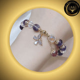 Magnifique bracelet en Améthyste, Cristal & zircon disponible chez Les Flammes de la Lumière