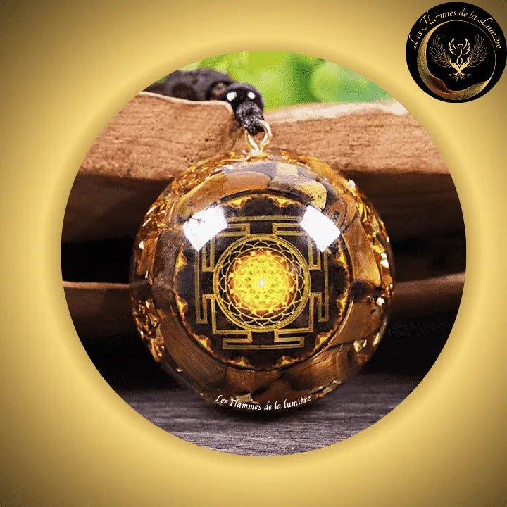 Oeil de Tigre - Beau Collier - pendentif orgone - Sri Yantra - Géométrie Sacrée disponible chez Les Flammes de la Lumière