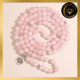Quartz Rose - Très beau bracelet Mala Tibétain - 108 perles - Lotus - 8 mm disponible chez Les Flammes de la Lumière