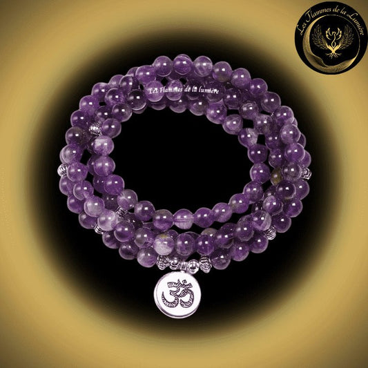 Améthyste - Très beau bracelet Mala Tibétain - OM ou Bouddha - 108 perles - 6mm disponible chez Les Flammes de la Lumière
