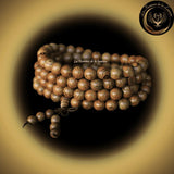 Très beau bracelet Mala Tibétain - Bois Wengé - 108 perles - 5 à 8 mm disponible chez Les Flammes de la Lumière