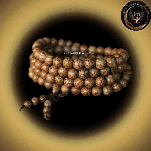 Très beau bracelet Mala Tibétain - Bois Wengé - 108 perles - 5 à 8 mm disponible chez Les Flammes de la Lumière