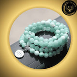 Fluorite - Très beau bracelet Mala Tibétain - Lotus - 108 perles - 8mm disponible chez Les Flammes de la Lumière