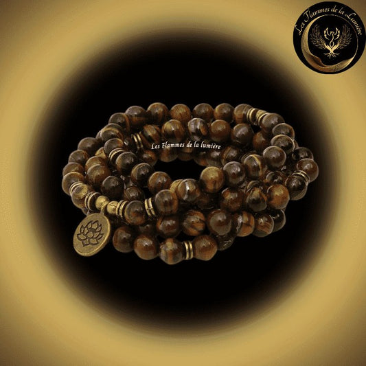 Oeil de Tigre - Très beau bracelet Mala Tibétain - Lotus / Bouddha / OM - 108 perles - 8 mm chez Les Flammes de la Lumière