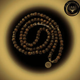 Oeil de Tigre - Très beau bracelet Mala Tibétain - Lotus / Bouddha / OM - 108 perles - 8 mm chez Les Flammes de la Lumière