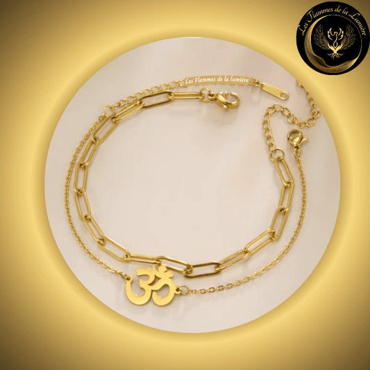 Très beau bracelet OM en acier inoxydable disponible chez Les Flammes de la Lumière