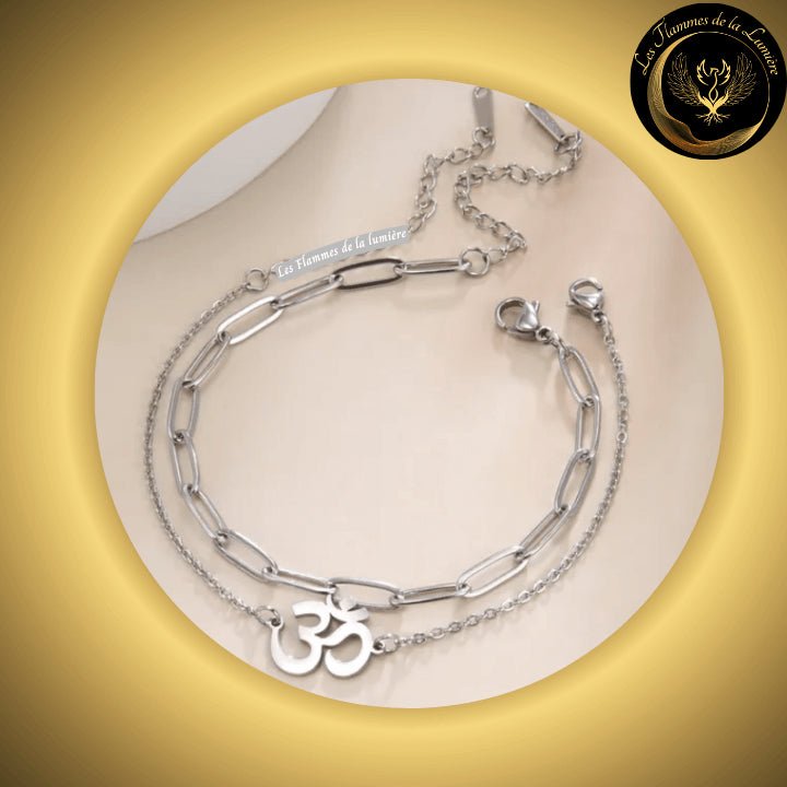 Très beau bracelet OM en acier inoxydable disponible chez Les Flammes de la Lumière