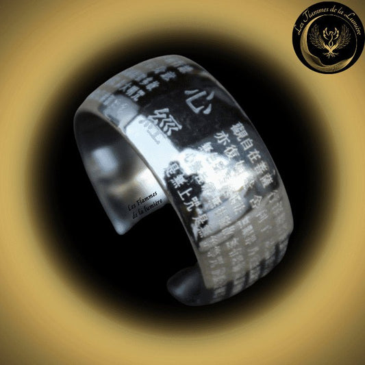 Très bel anneau pour homme - Bouddhiste - Acier inoxydable couleur Argent disponible chez Les Flammes de la Lumière
