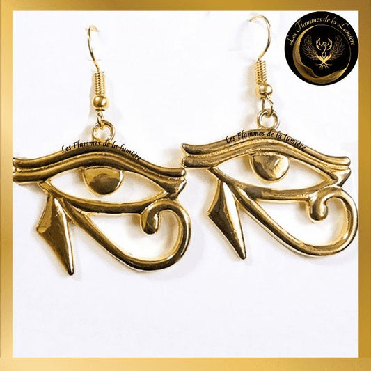 Très belles boucles d'oreilles avec Oeil d'Horus disponible chez Les Flammes de la Lumière