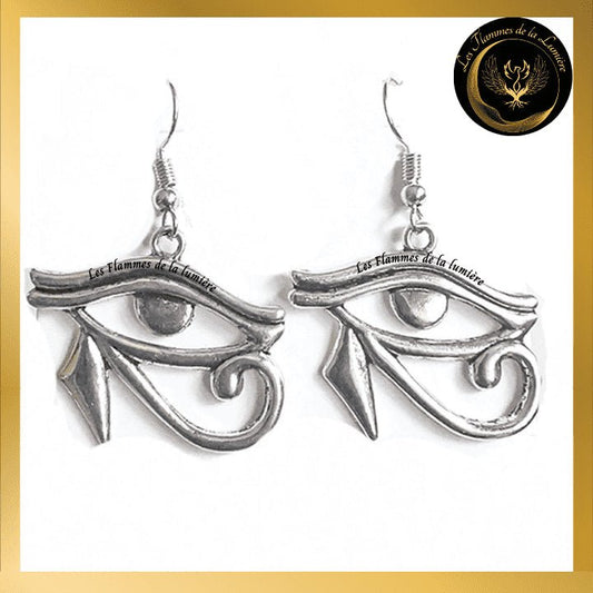 Très belles boucles d'oreilles avec Oeil d'Horus disponible chez Les Flammes de la Lumière