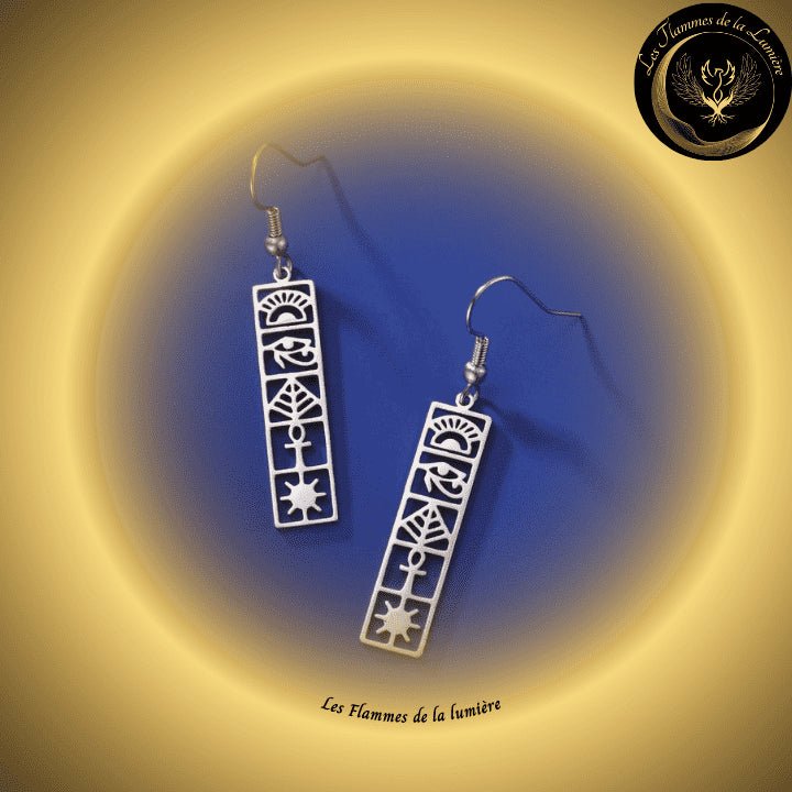 Très belles boucles d'oreilles Egyptienne - Acier inoxydable - couleur argent disponible chez Les Flammes de la Lumière